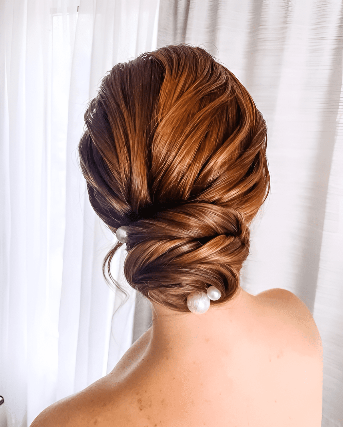 clean low bun with pearls