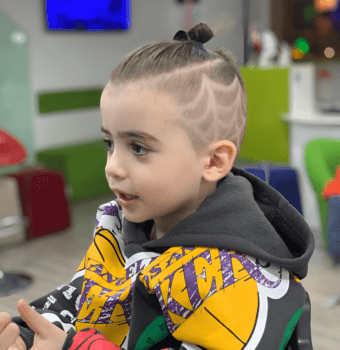 artistic undercut with top knot