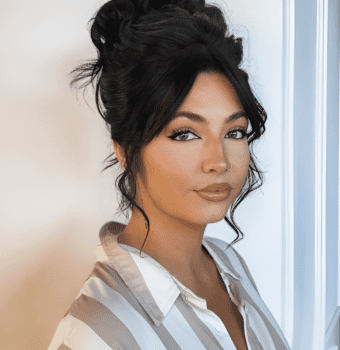 elegant updo with romantic whispers
