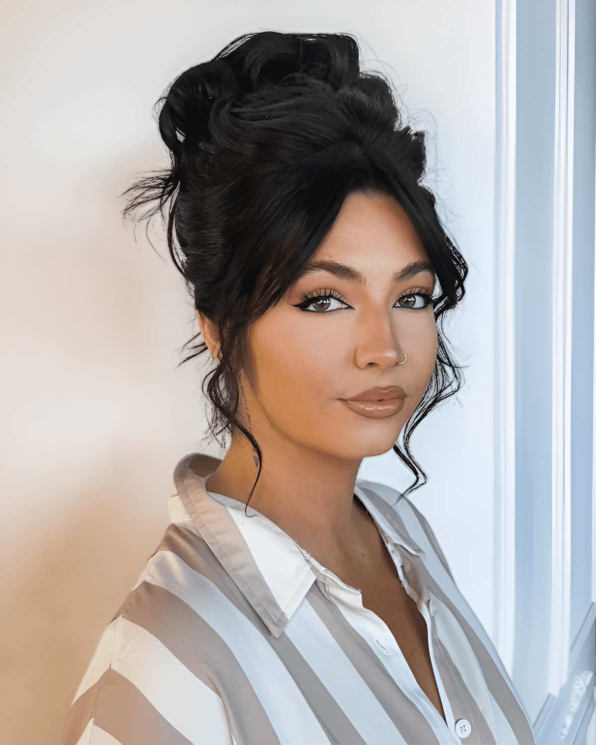 elegant updo with romantic whispers